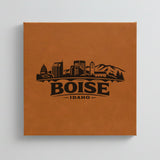 Close up of the Boise, Idaho skyline engraved on Brown leatherette