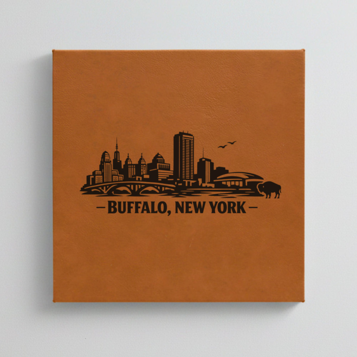 Close up of the Buffalo, New York skyline engraved on Brown leatherette