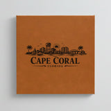 Close up of the Cape Coral, Florida skyline engraved on Brown leatherette