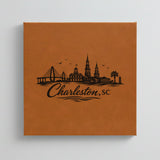 Close up of the Charleston, South Carolina skyline engraved on Brown leatherette