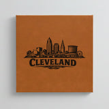 Close up of the Cleveland, Ohio skyline engraved on Brown leatherette