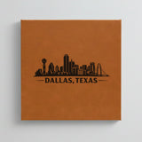 Close up of the Dallas, Texas skyline engraved on Brown leatherette