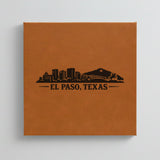 Close up of the El Paso, Texas skyline engraved on Brown leatherette