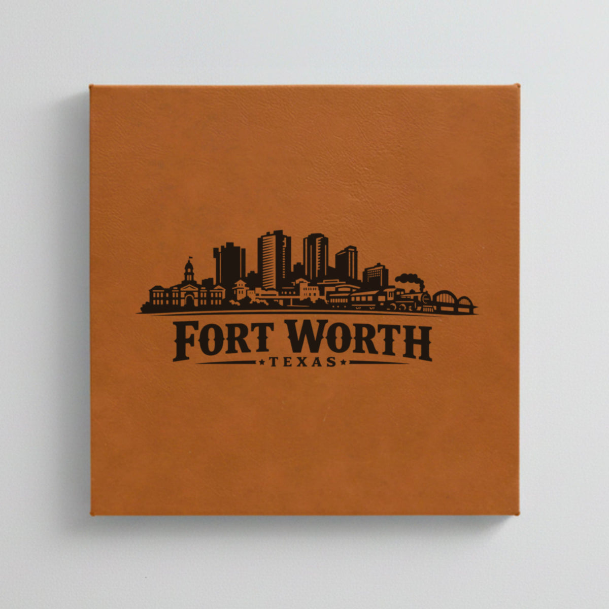 Close up of the Fort Worth, Texas skyline engraved on Brown leatherette