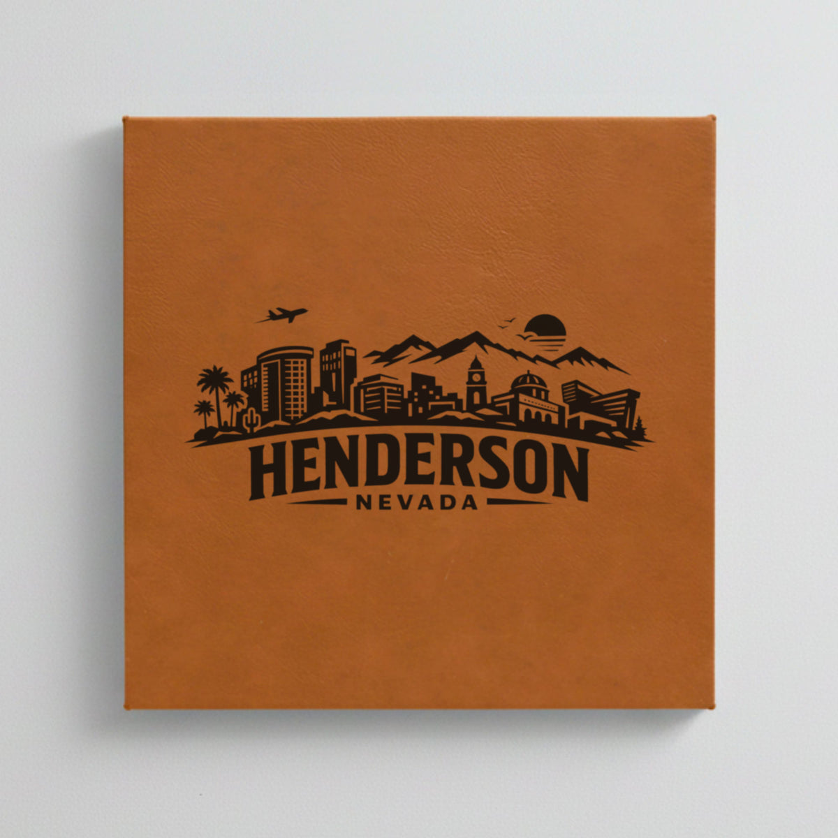 Close up of the Henderson, Nevada skyline engraved on Brown leatherette