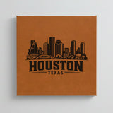 Close up of the Houston, Texas skyline engraved on Brown leatherette