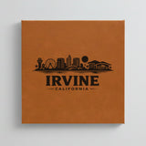 Close up of the Irvine, California skyline engraved on Brown leatherette