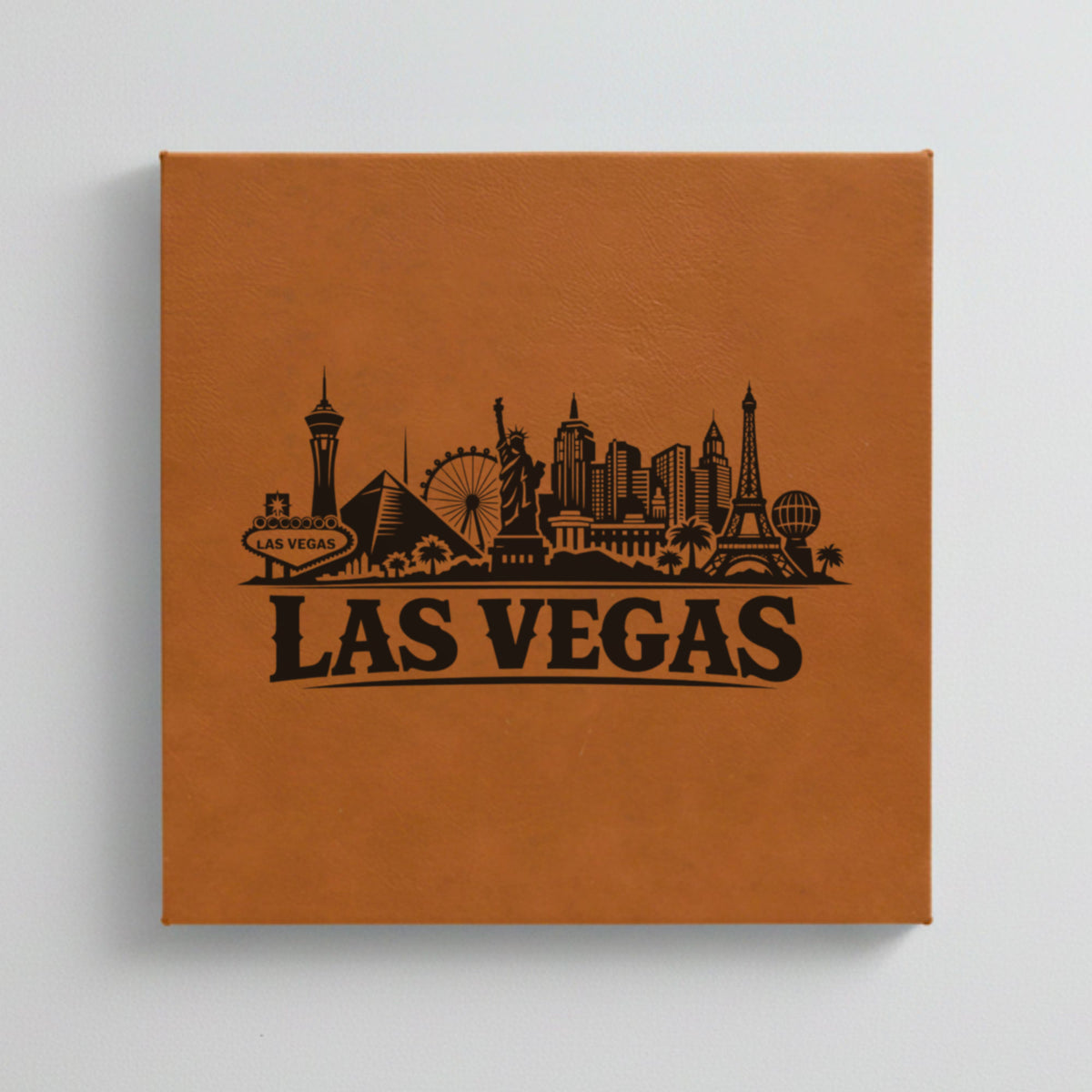 Close up of the Las Vegas, Nevada skyline engraved on Brown leatherette