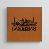 Close up of the Las Vegas, Nevada skyline engraved on Brown leatherette