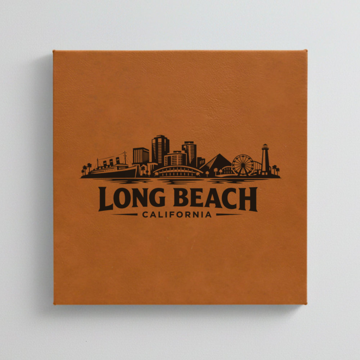 Close up of the Long Beach, California skyline engraved on Brown leatherette