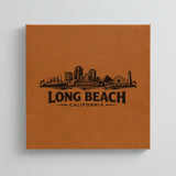 Close up of the Long Beach, California skyline engraved on Brown leatherette