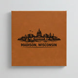 Close up of the Madison, Wisconsin skyline engraved on Brown leatherette