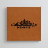 Close up of the Memphis, Tennessee skyline engraved on Brown leatherette