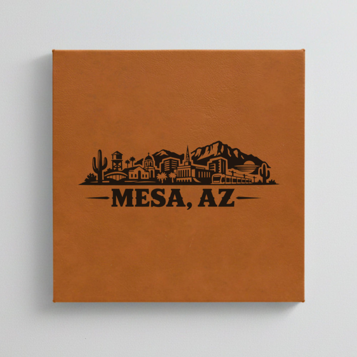 Close up of the Mesa, Arizona skyline engraved on Brown leatherette