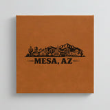 Close up of the Mesa, Arizona skyline engraved on Brown leatherette