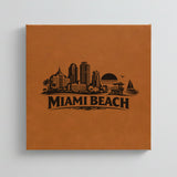Close up of the Miami Beach, Florida skyline engraved on Brown leatherette