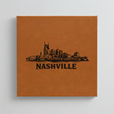 Close up of the Nashville, Tennessee skyline engraved on Brown leatherette