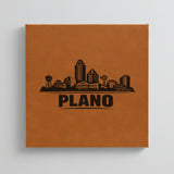 Close up of the Plano, Texas skyline engraved on Brown leatherette