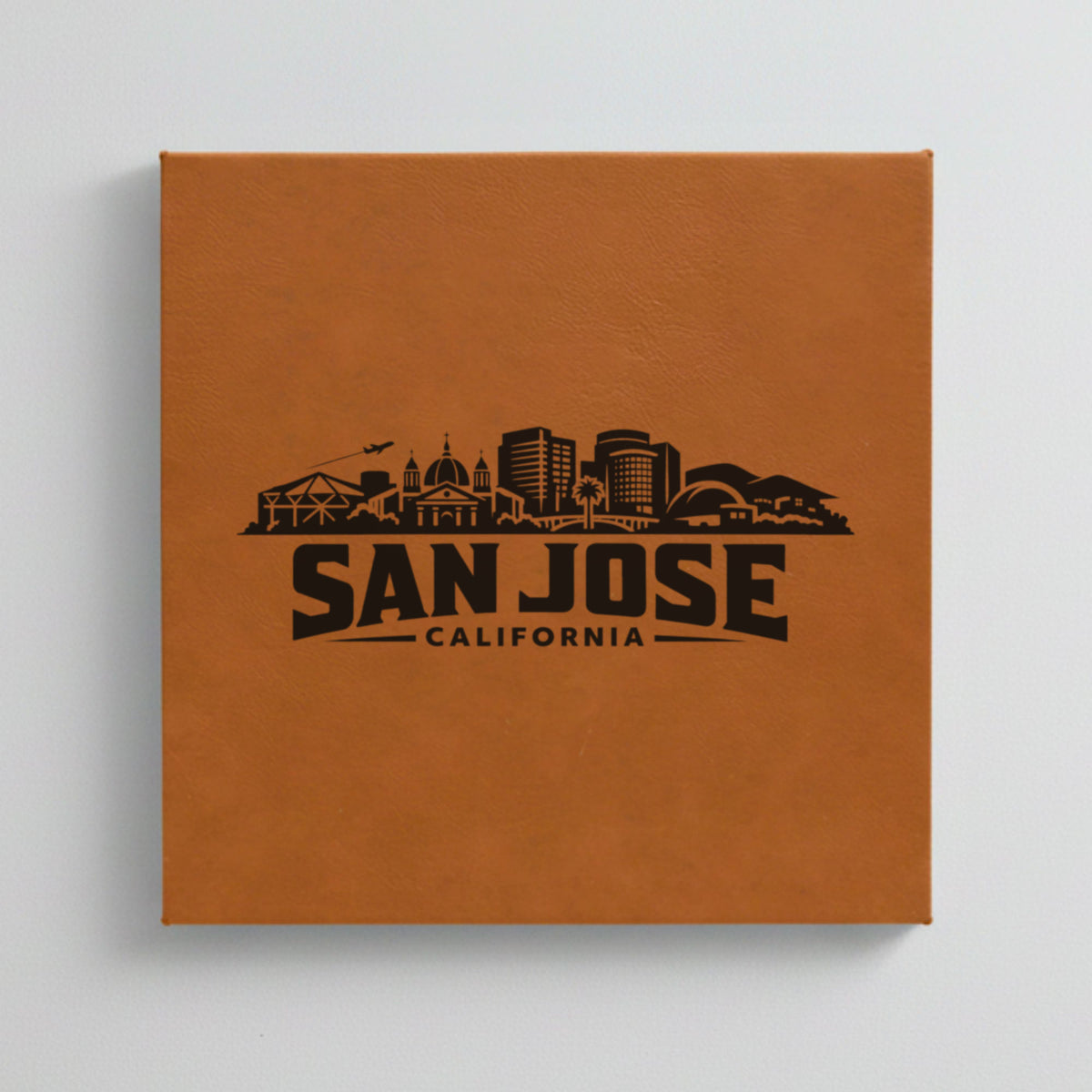 Close up of the San Jose, California skyline engraved on Brown leatherette