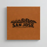 Close up of the San Jose, California skyline engraved on Brown leatherette