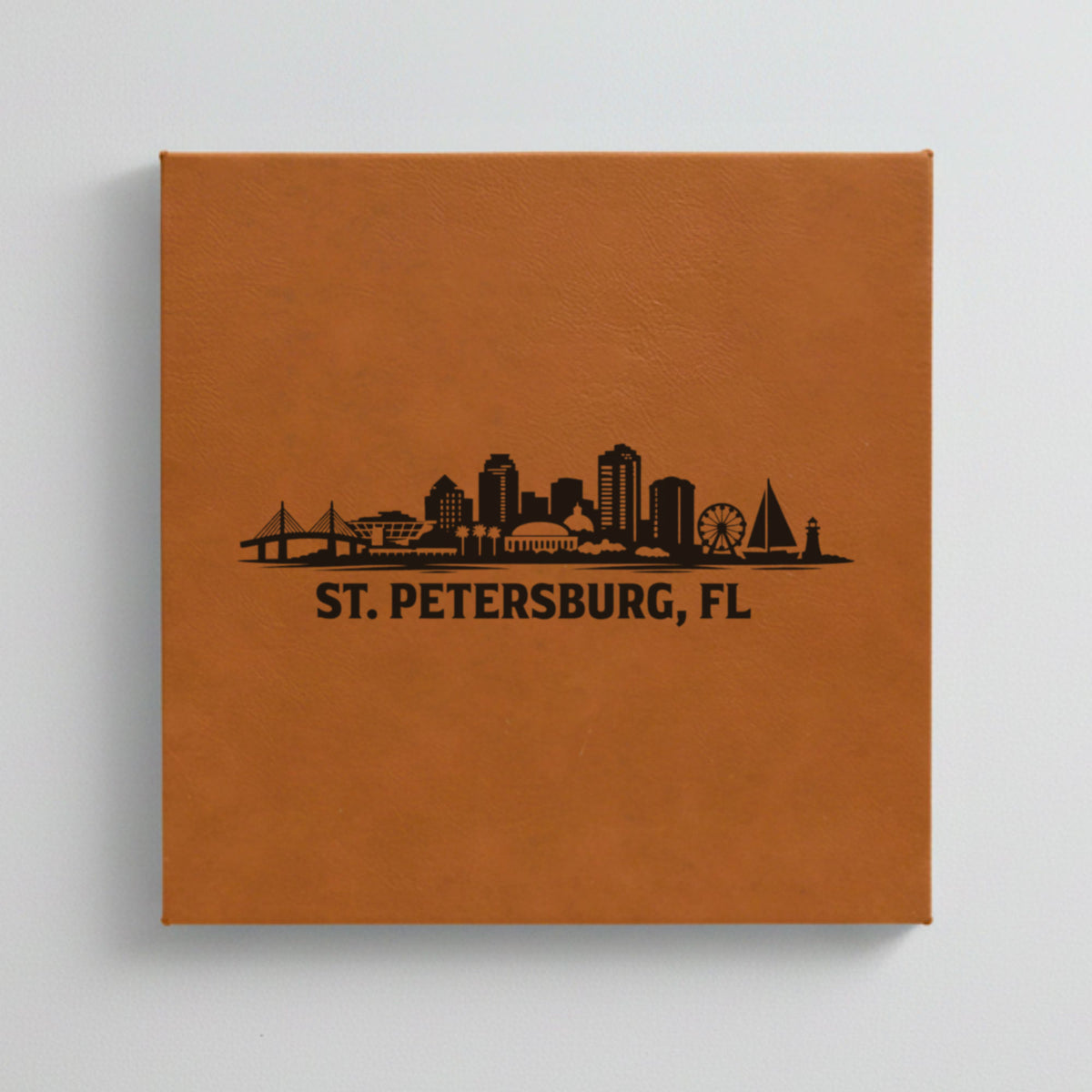 Close up of the St. Petersburg, Florida skyline engraved on Brown leatherette