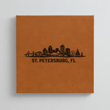 Close up of the St. Petersburg, Florida skyline engraved on Brown leatherette