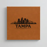 Close up of the Tampa, Florida skyline engraved on Brown leatherette