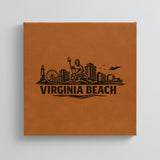 Close up of the Virginia Beach, Virginia skyline engraved on Brown leatherette