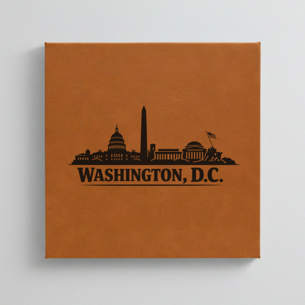 Close up of the Washington, DC skyline engraved on Brown leatherette