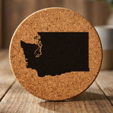 Washington round cork coaster with the full state shape engraved