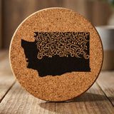 Washington round cork coaster engraved with the state shape in ornate floral scrollwork
