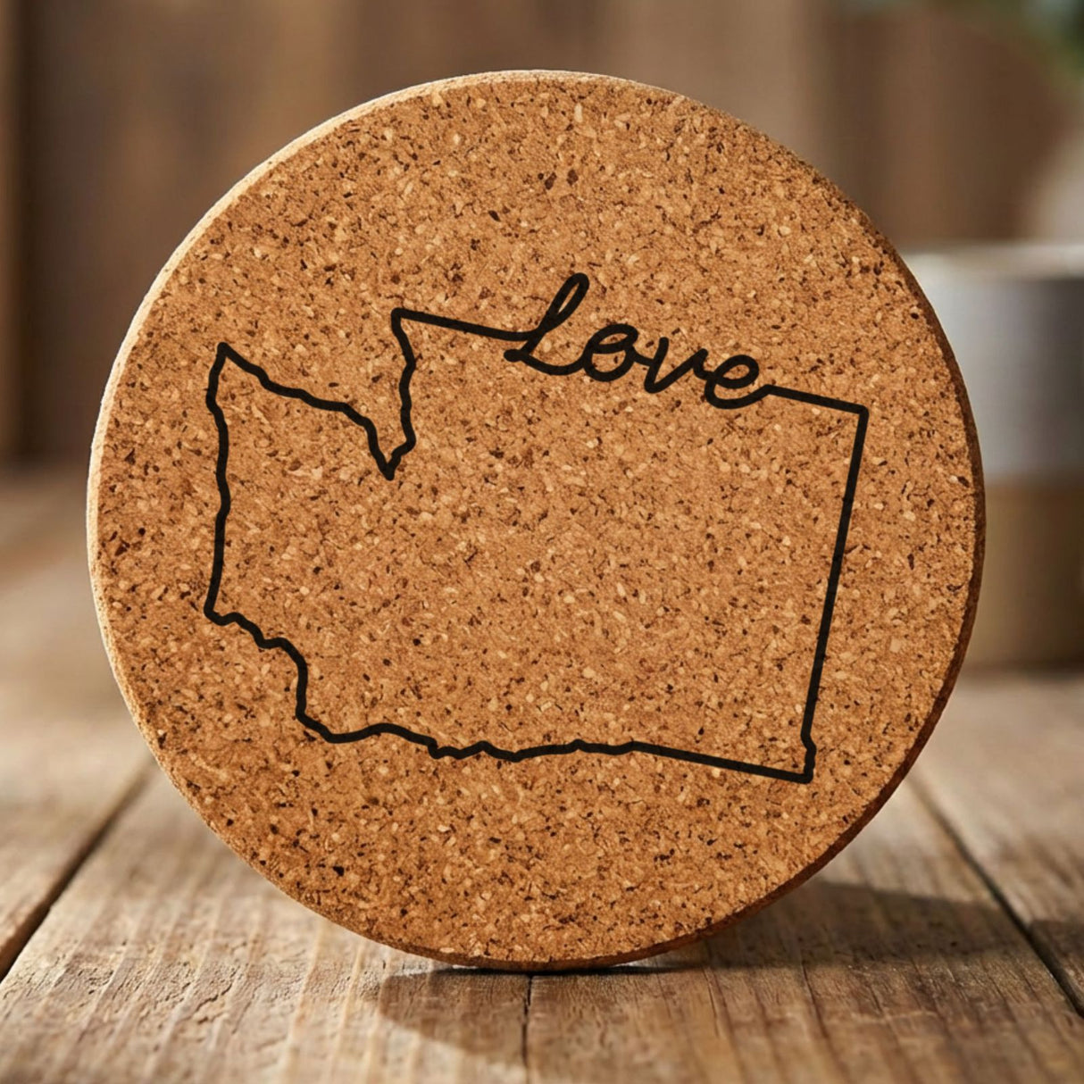 Washington round cork coaster engraved with a hand-drawn state outline and love in cursive