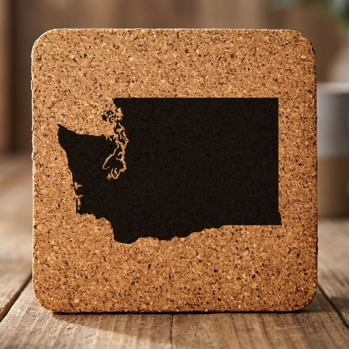 Washington square cork coaster with the full state shape engraved
