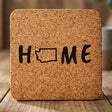 Washington square cork coaster engraved with HOME using the state outline as the letter O