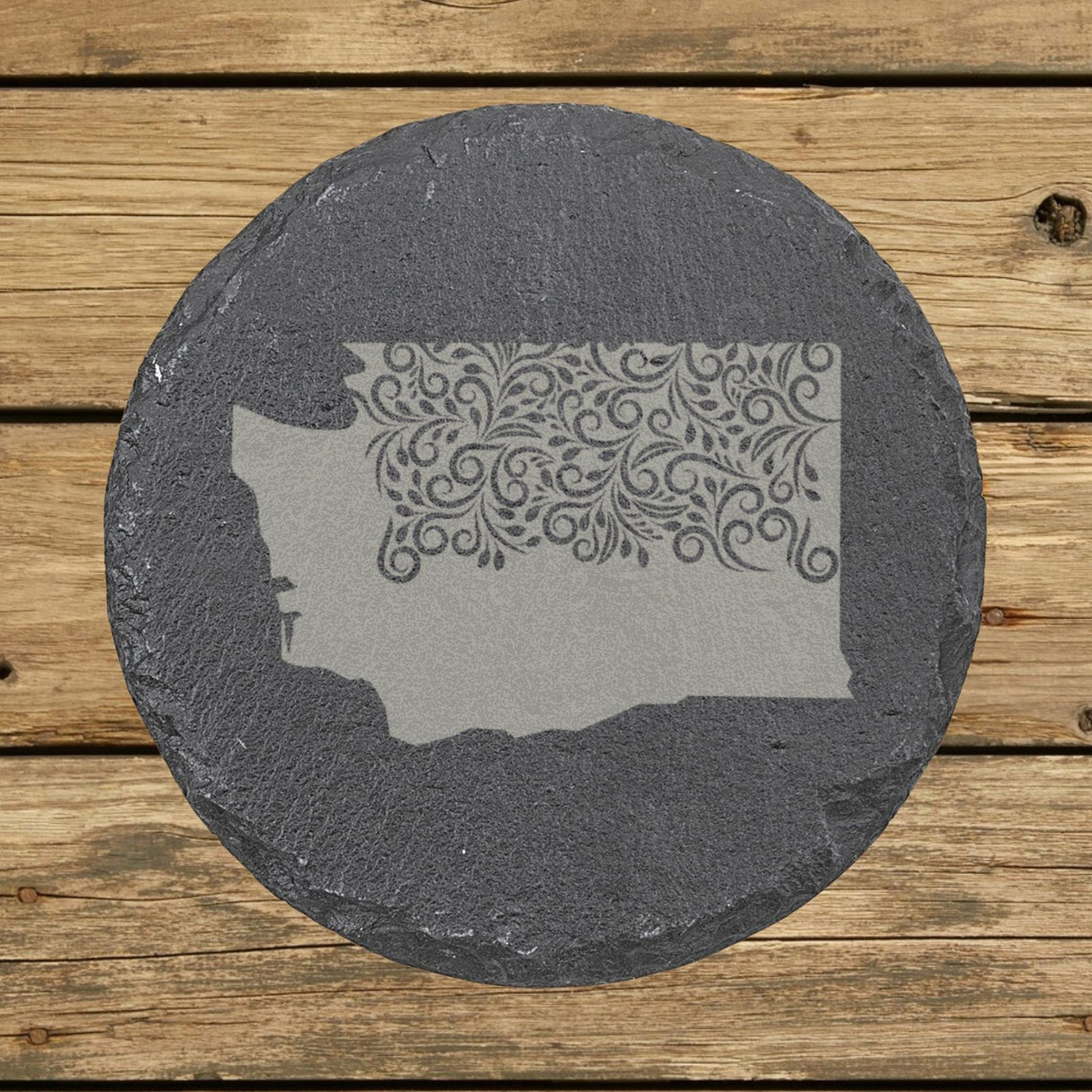 Washington round slate coaster engraved with the state shape in ornate floral scrollwork