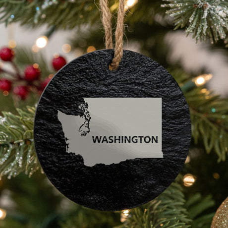 Washington round slate Christmas ornament engraved with the state shape and WASHINGTON in bold lettering