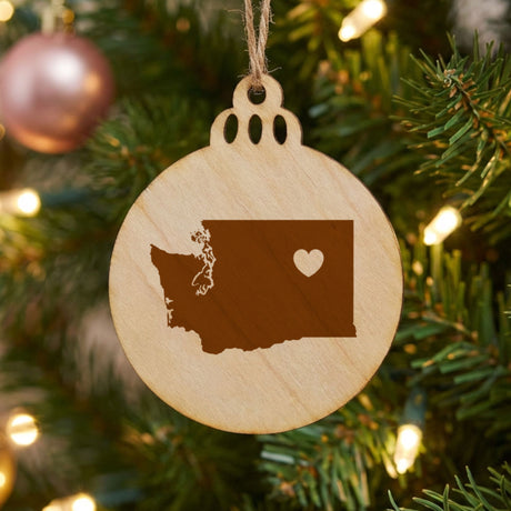 Washington round wood Christmas ornament engraved with the state shape and a heart