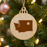 Washington round wood Christmas ornament engraved with the state shape and a star