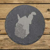 West Virginia round slate coaster engraved with the state shape in ornate floral scrollwork