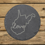 West Virginia round slate coaster engraved with a hand-drawn state outline and love in cursive