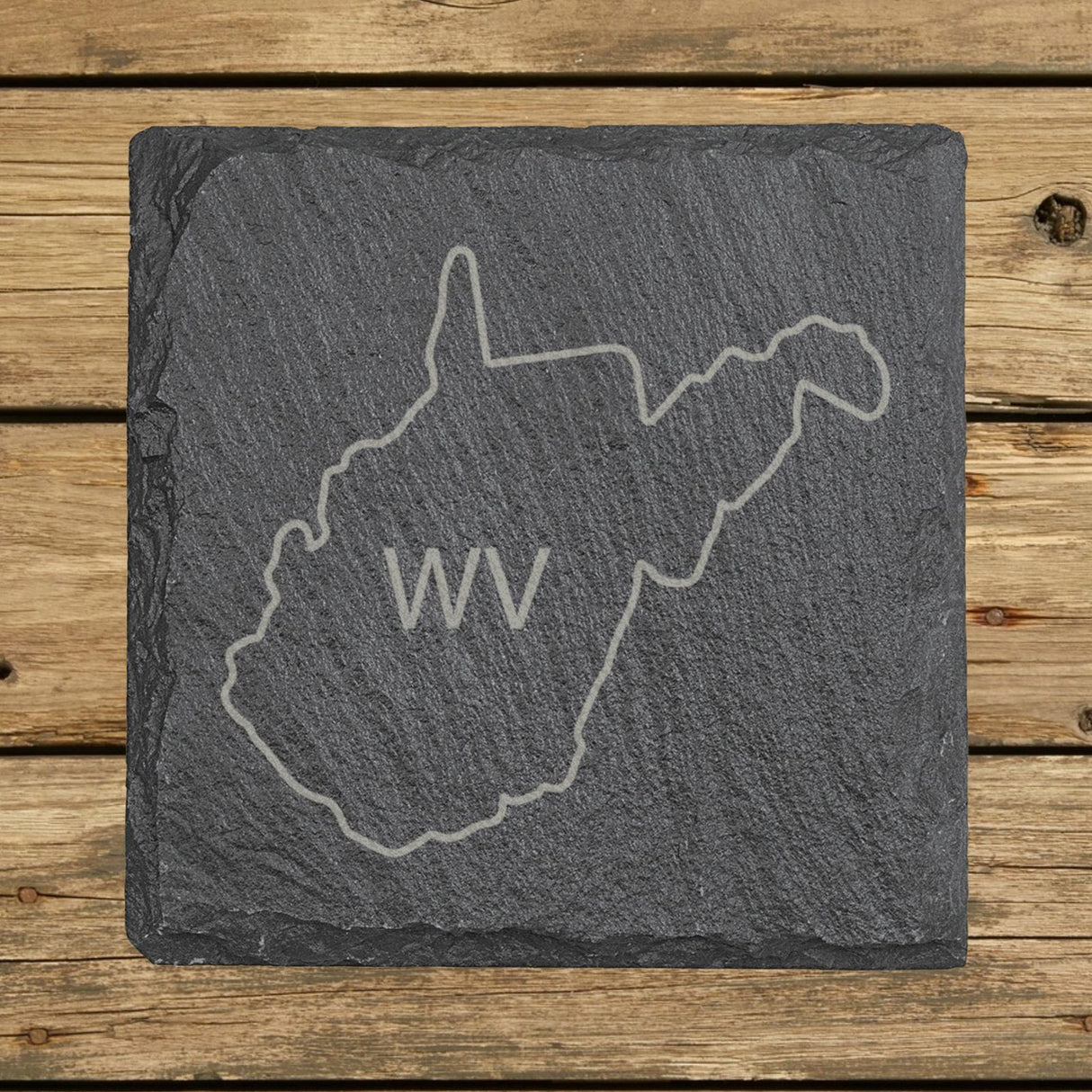 West Virginia square slate coaster engraved with the state outline and WV initials
