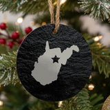 West Virginia round slate Christmas ornament engraved with the state shape and a star