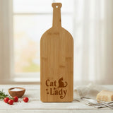 Bamboo wine bottle shaped cutting board laser engraved with "Cat Lady"