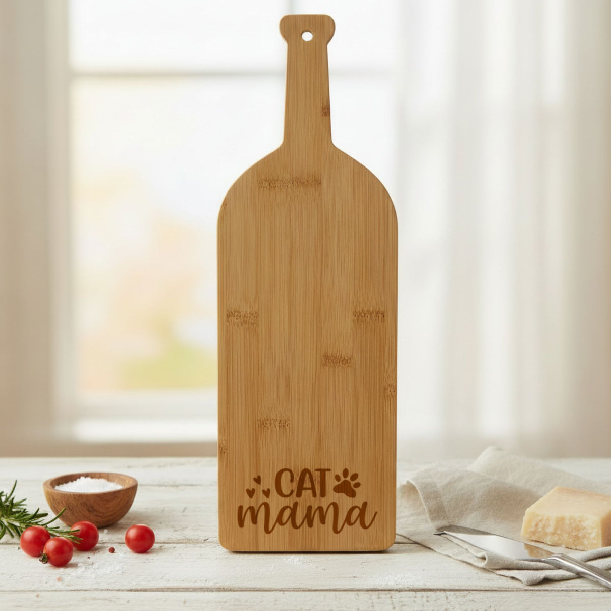 Bamboo wine bottle shaped cutting board laser engraved with "Cat Mama"