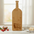 Bamboo wine bottle shaped cutting board laser engraved with "Save Water, Drink Wine"