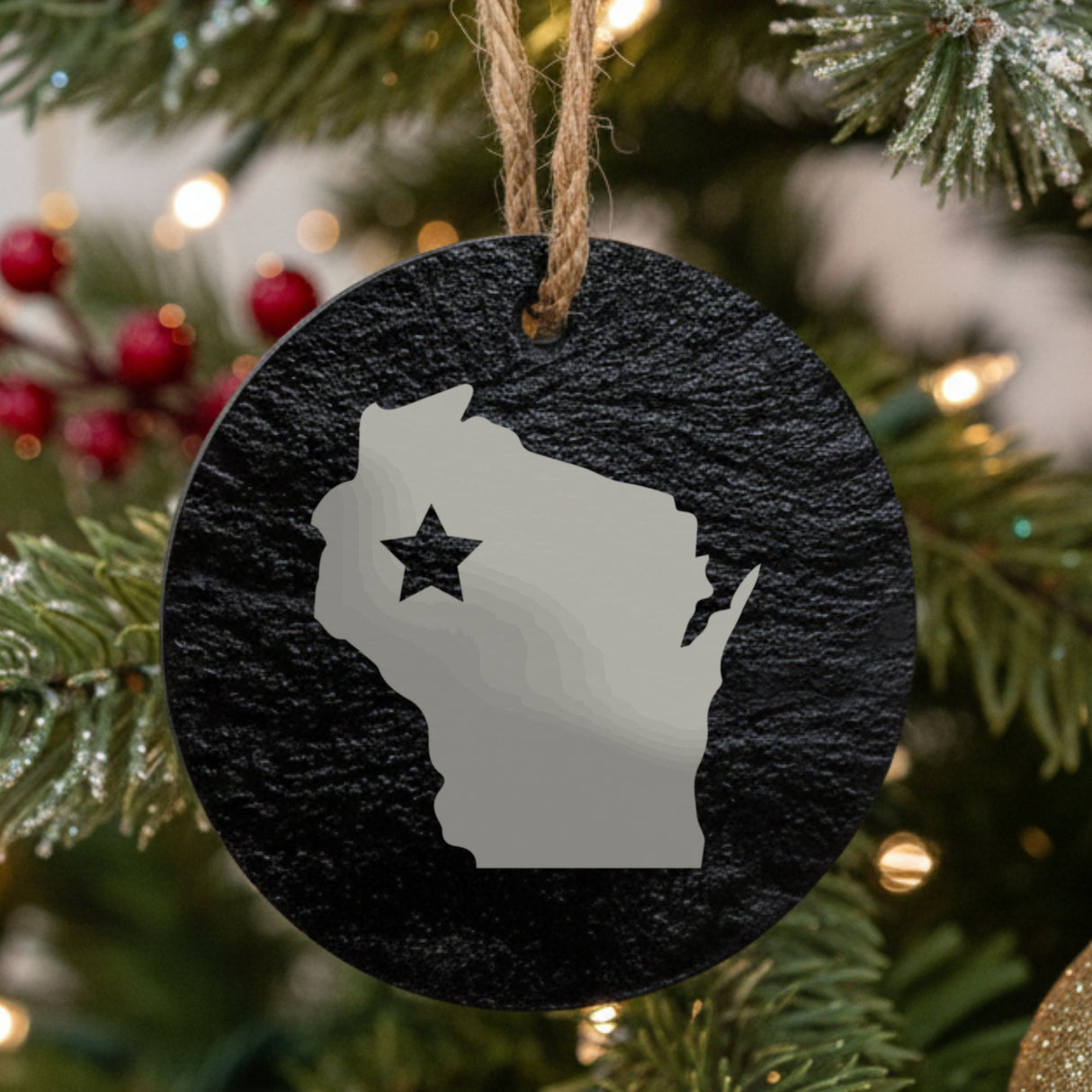 Wisconsin round slate Christmas ornament engraved with the state shape and a star