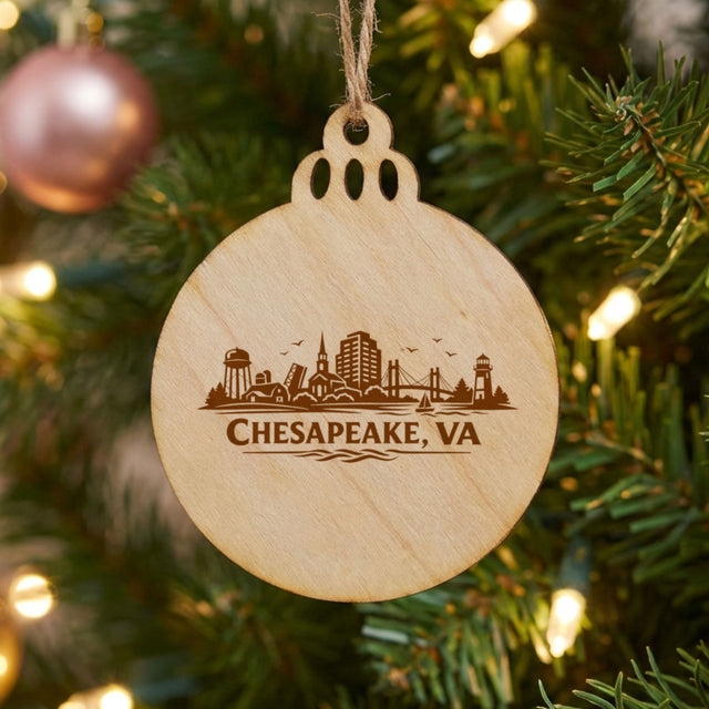 Chesapeake, Virginia skyline engraved on a round wood Christmas ornament