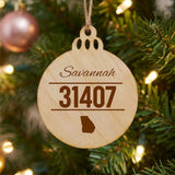Wood Christmas ornament laser engraved with a custom zip code design