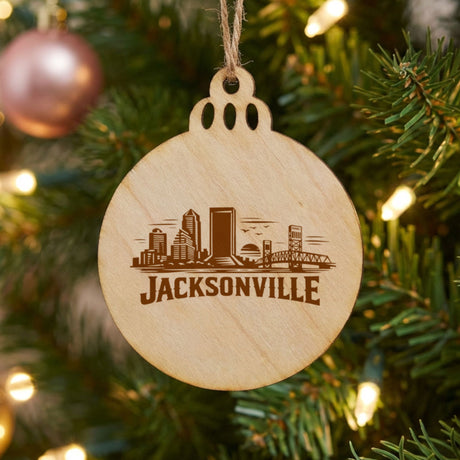 Jacksonville, Florida skyline engraved on a round wood Christmas ornament