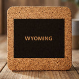 Wyoming square cork coaster engraved with the state shape and WYOMING in bold lettering